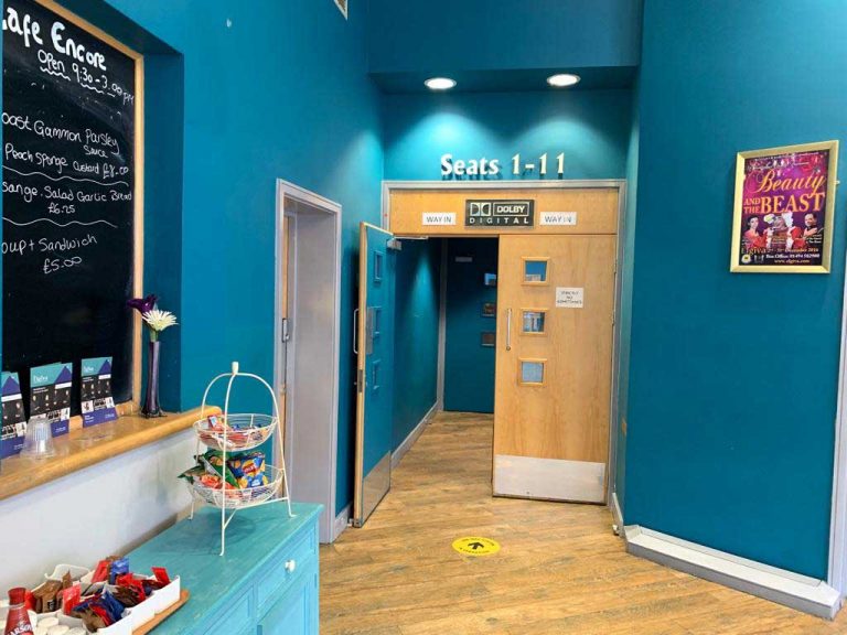 Auditorium entrance for seat numbers 1-11, next to the café bar